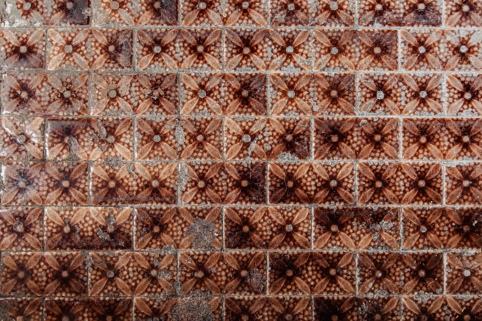 The patterned tile around the fireplace in Dr. Rosen's office